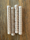Textured rolling pins